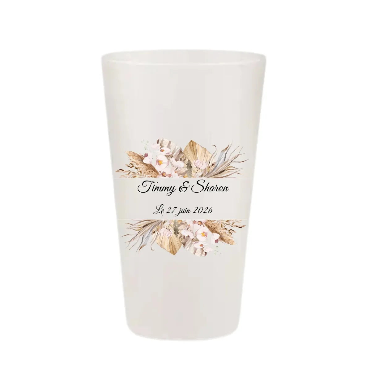 Gobelet de mariage personnalisé avec une composition florale de feuilles de palmier séchées, orchidées blanches et herbes de pampas.